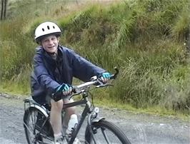 Alasdair perseveres up the hill despite being cold, tired and wet - 33.2 miles into the ride